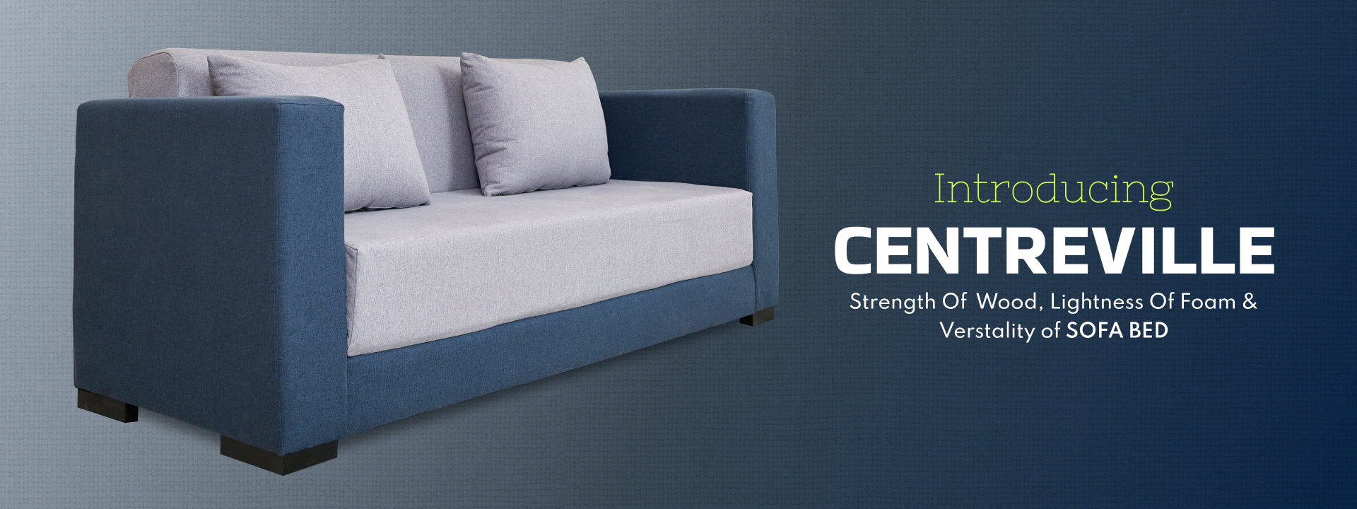 Blue sofa bed with white cushions on a dark blue background